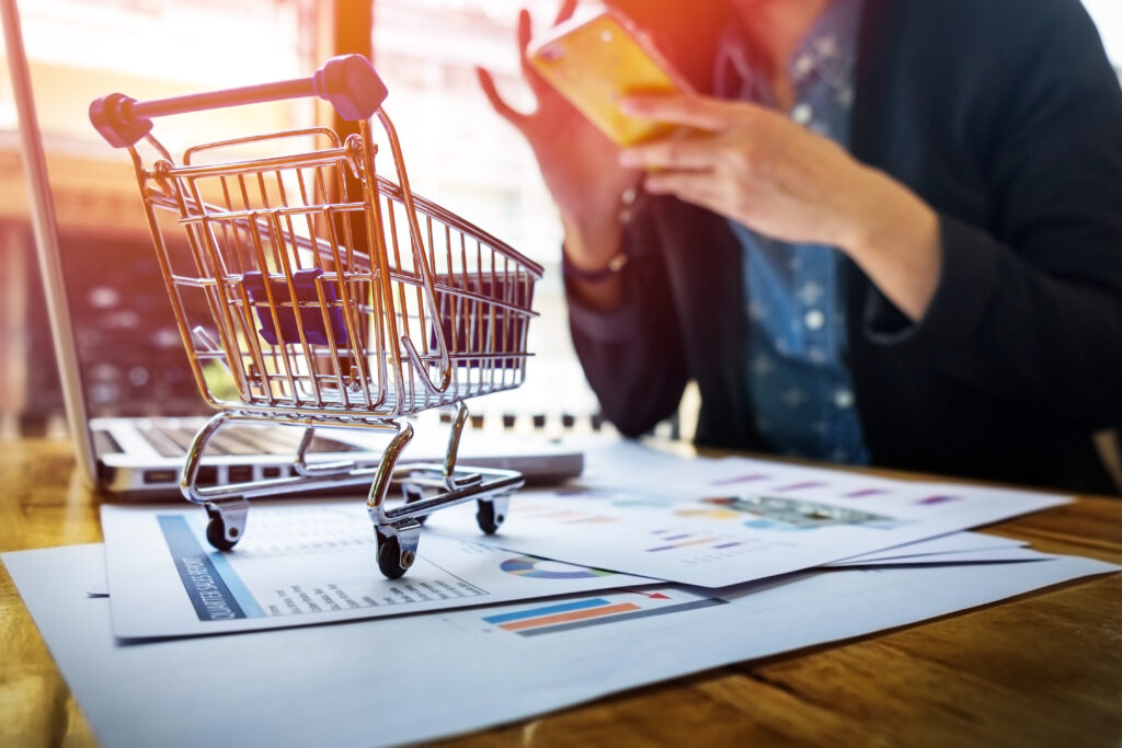 cropped image woman inputting card information key phone laptop while shopping online scaled